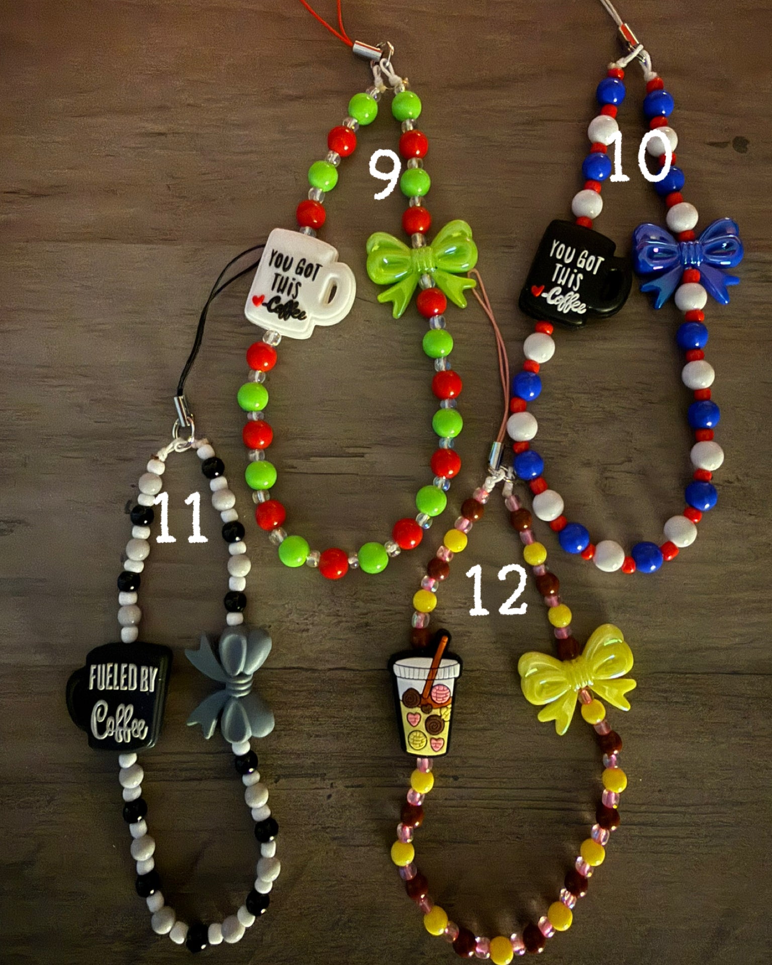 Four beaded wristlet charms featuring coffee-themed charms and bows in lime green, blue/red/white, monochrome, and yellow/brown color schemes.