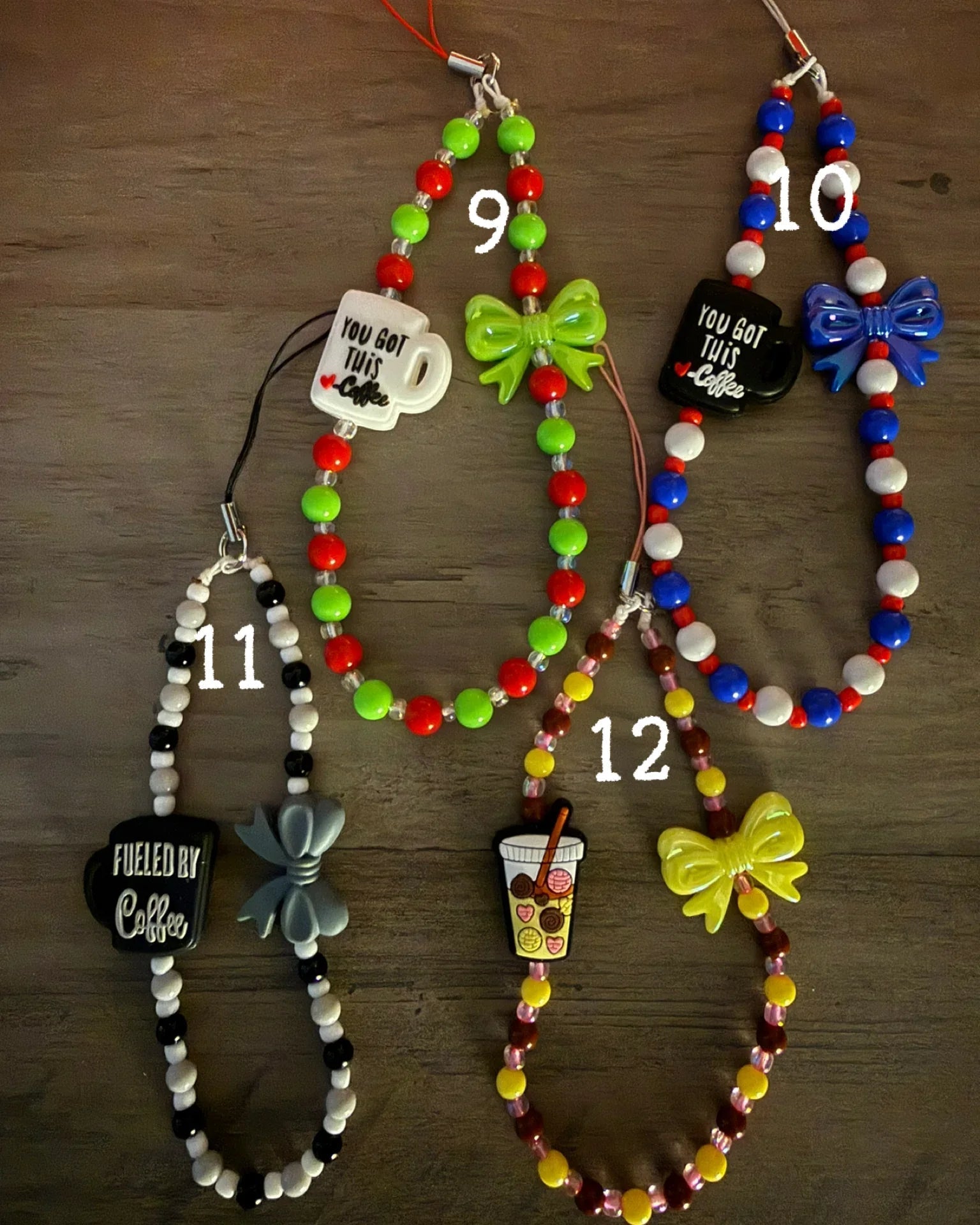 Coffee-themed phone charms, featuring designs like coffee cups, bows, and a drink cup, with vibrant beads in various colors.